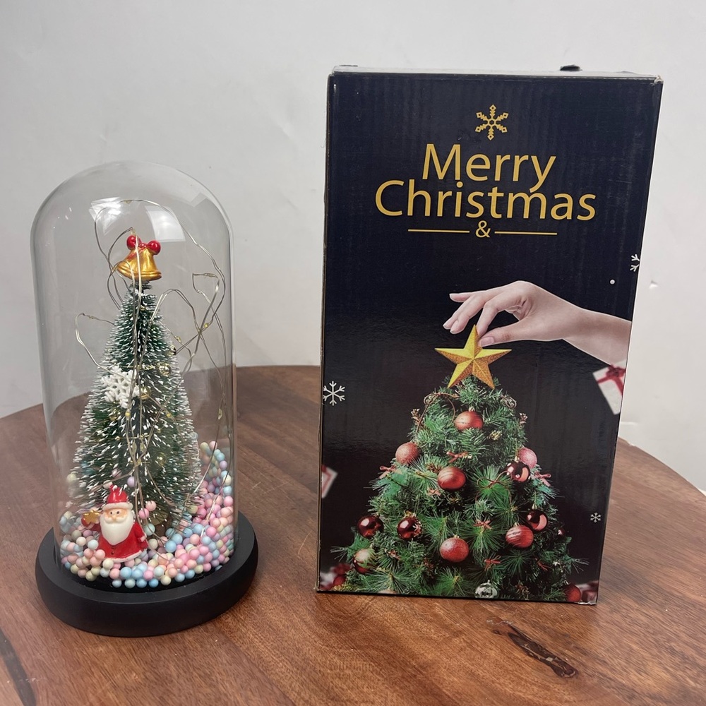 Glowing glass dome mini Christmas tree.